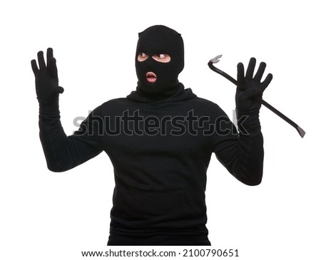 Thief in mask with crowbar on white background