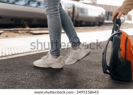 Thief Steals Backpack at Train Station on Platform While Woman Turned Away