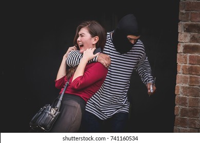 Thief Threatening Knife Young Woman Scared Stock Photo 741160534 ...