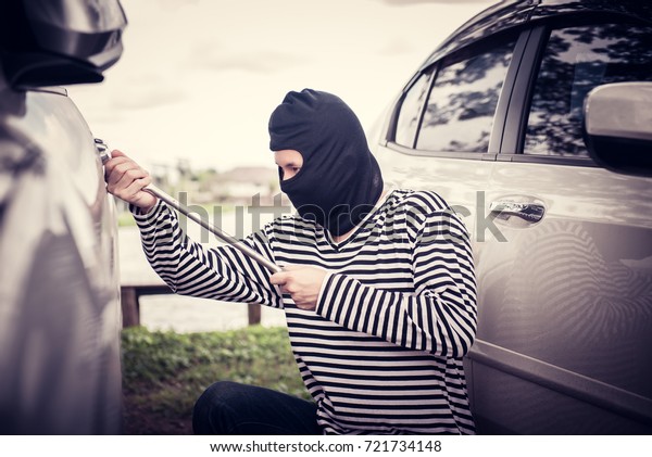 Thief is\
trying to steal the car at the public\
parking