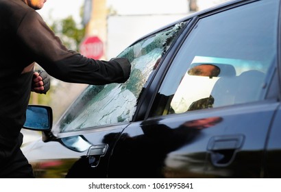 Thief Vandalism Man Broke The Glass Of The Car Smashed Hit Damage Car Glass Window With Hand