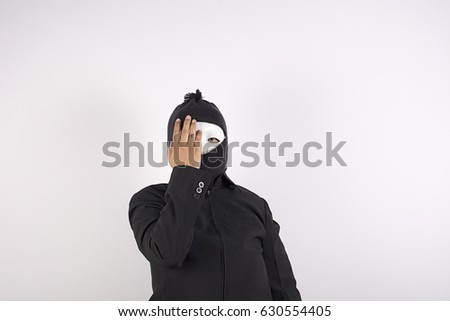 Thief woman hands covering face.
