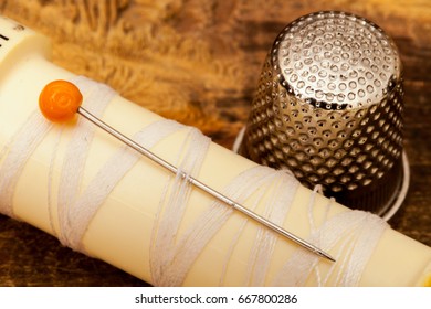 Thimble and thread
