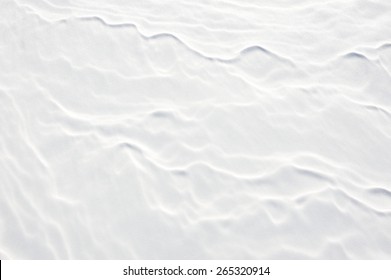 Thin crust of ice over snow. - Shutterstock ID 265320914