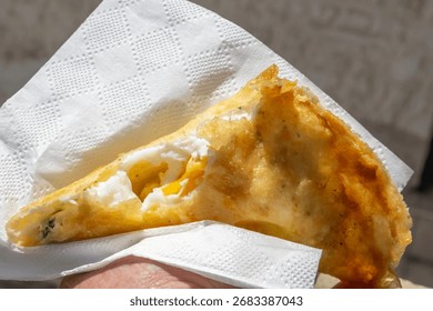 Thin fried bread filled with eggs. Yemenite Jewish foods.