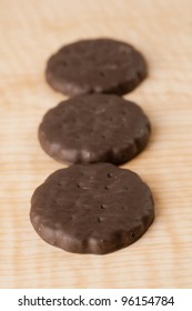 Thin Mints On Wooden Table.