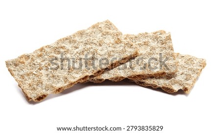 Thin rye crispbread isolated on white background, side view