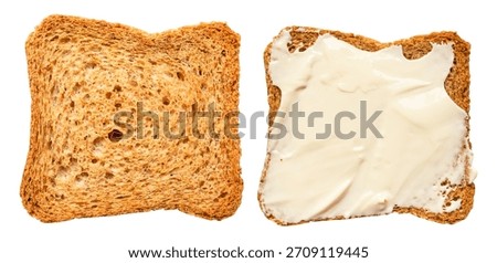 thin square rusk of multigrain wheat bread empty and with butter cutout on white background