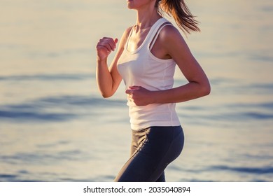 Thin Woman Running By The Sea