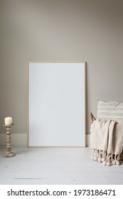 Thin Wood Frame Poster Mockup, Resting On The Floor And Styled For Fall Or Winter. Cosy Props.