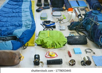 Things and accessories for trekking camping and travel, flat lay, top view set - Powered by Shutterstock