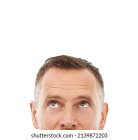Things may be looking up. Cropped studio shot of a man looking up at copyspace isolated on white. - Shutterstock ID 2139872203