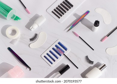 Things for the work of lash-makers, artificial eyelashes, microbrachis, glue, tweezers, combs, brushes for eyelash extensions. Eyelash extension, painting of eyebrows.