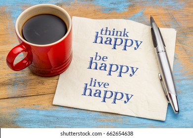 think, be, live happy - handwriting on a napkin with a cup of espresso coffee