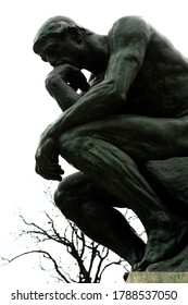 
The thinker against a cloudy sky
