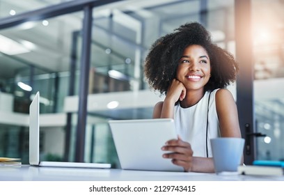 Thinking about how to take the business to technological heights. Cropped shot of an attractive young businesswoman working in her office. - Powered by Shutterstock