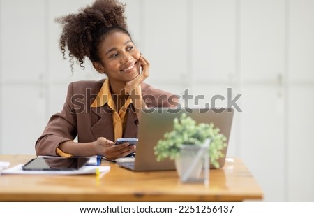 Thinking about how to take the business to technological heights. Cropped shot of an attractive young african american businesswoman working in her office, looking away.