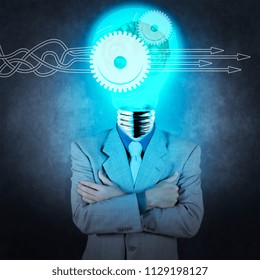 Thinking about structuring virtual diagram of business process with solutions. businessman with lamp-head 3d metal brain as concept