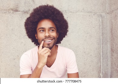 Thinking african american hipster man