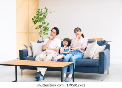 Thinking asian family in the modern interior. Lifestyle concept. - Shutterstock ID 1795812781