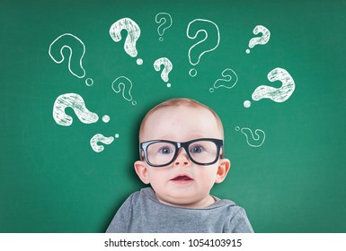 Thinking Baby With Question Marks On Background