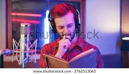 Thinking, book or singer in studio with tech, songwriting or brainstorming in creative production. Reflection, mic or man in booth with headphones, melody writing or album ideas in music development.