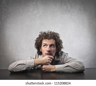 Thinking businessman - Powered by Shutterstock