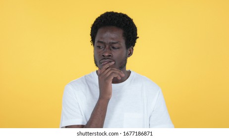 Thinking Casual African Man Got New Idea Isolated on Yellow Background - Shutterstock ID 1677186871
