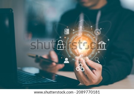 thinking and creative concept, Close up the light bulb and man working on the desk, Creativity, and innovation are keys to success,  new idea and innovation with Brain and light bulbs,big data