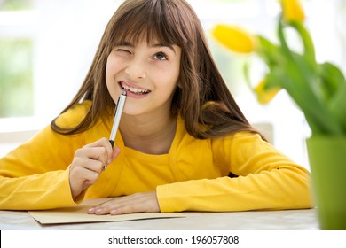 Thinking Cute Girl Writing Card For Mother's Day