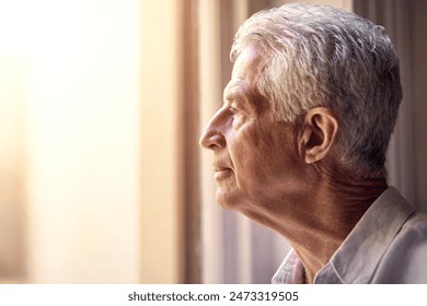 Thinking, depression and senior man in home living room to remember memory, reflection or vision. Sad, retirement and serious person with alzheimer, idea and planning decision with view in profile - Powered by Shutterstock