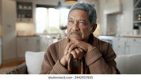 Thinking, depression and senior man with walking stick on chair with Alzheimer, memory loss or lonely. Face, anxiety and elderly male with a disability and mobility cane in living room sad or stress - Powered by Shutterstock