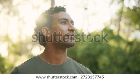 Thinking, explore or man in forest with hiking, fresh air or contemplation on trekking journey. Reflection, bokeh or person in nature with thoughts, mindfulness or daydreaming in outdoor adventure.