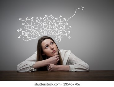 Thinking. Girl solving a problem. - Shutterstock ID 135457706