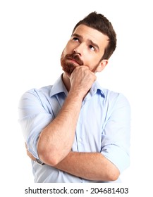 Thinking Man Isolated On White Background. Closeup Portrait Of A Casual Young Pensive Businessman Looking Up At Copyspace. Caucasian Male Model. 