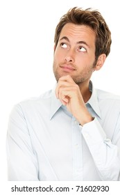 Thinking Man Isolated On White Background. Closeup Portrait Of A Casual Young Pensive Businessman Looking Up At Copyspace. Caucasian Male Model.