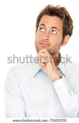 Thinking man isolated on white background. Closeup portrait of a casual young pensive businessman looking up at copyspace. Caucasian male model.