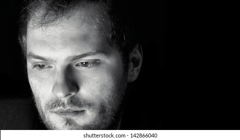 Thinking man in low key technique