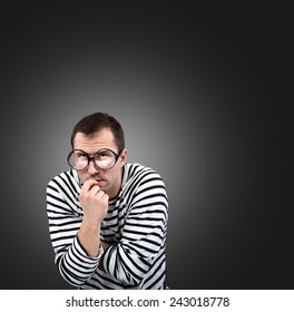 Thinking man, studio portrait