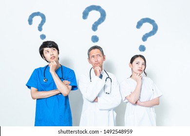 Thinking Medical Staff. Medical Doctor And Nurses.