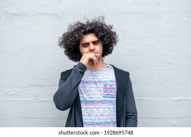 Thinking Middle Eastern Man, Plain Background, Alone