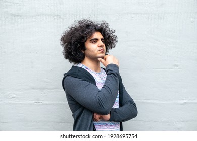 Thinking Middle Eastern Man, Plain Background, Alone