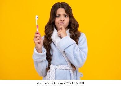 Thinking Pensive Clever Teenager Girl. Teen Girl Hold Toothbrush, Childhood Happiness, Morning Routine. Brush Teeth, Dental Health And Oral Care. Child Brush Her Teeth.