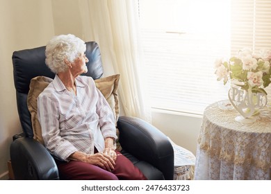 Thinking, relax and senior woman on a chair at nursing home window with nostalgia, remember or calm reflection. Peace, memory and elderly female person in retirement house with wisdom, break or rest - Powered by Shutterstock