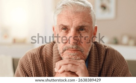 Thinking, sad and memory with old man on sofa for Alzheimer, retirement and reflection. Thoughtful, depression and loneliness with senior person in living room of home for dementia and mental health