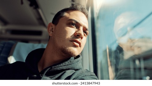 Thinking, sad and young man on train with mental health problem or loneliness on trip or journey. Depression, upset and male person from Canada on public transportation for vacation or holiday. - Powered by Shutterstock