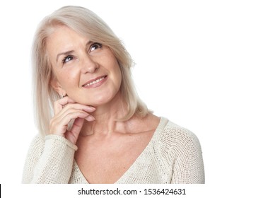 Thinking Senior Woman Looking Up Isolated On White Background