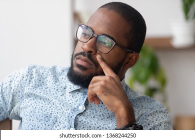 Thinking Of Solution Concept, Pensive Serious African American Businessman Looking Away Deep Lost In Thoughts, Thoughtful Dreamy Or Doubtful Black Man Searching New Ideas Planning Business Vision