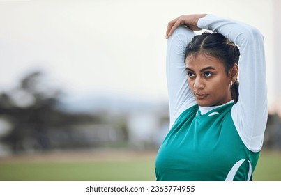 Thinking, stretching and a woman hockey player getting ready for the start of a game or competition outdoor. Sports, fitness and warm up with a young athlete on a field for a training workout - Powered by Shutterstock