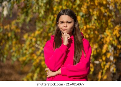 Thinking Teen Girl Outdoor In Autumn Season